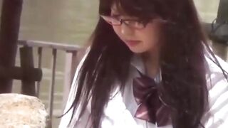 Sporty Japanese babe filmed playing in a tiny short skirt
