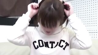 Japanese cutie fills the container with her yellow warm pee