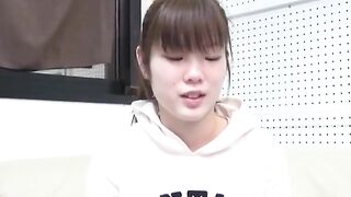 Japanese cutie fills the container with her yellow warm pee