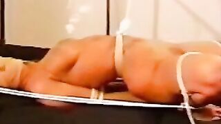 Teen's fist bondage scene