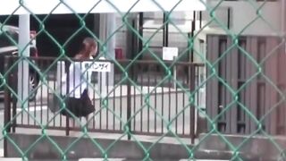 Slim college Japanese filmed by a voyeur pissing outside