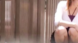 Slim college Japanese filmed by a voyeur pissing outside
