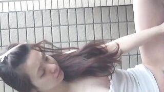 Japanese gal fills cup with yellow pee from hairy pussy