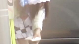 Short skirt brunette stars in a Japanese hidden camera