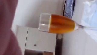Japanese babe pees multiple times to fill a big container