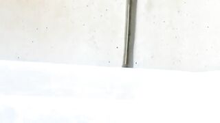 Witness a lovely lady fill a container with her warm urine