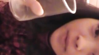 Perverted Asian lets us watch her fill a cup with pee
