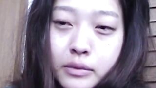 Perverted Asian lets us watch her fill a cup with pee