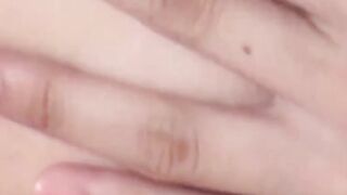 Deviant cameraman spies Asian hottie fingering herself