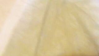 Japanese babes golden stream fills the container on camera