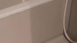 Japanese babes golden stream fills the container on camera