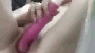 peeking at my stepsister as she toys on bed