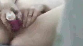 peeking at my stepsister as she toys on bed