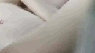 peeking at my stepsister as she toys on bed