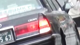 Rain didnt stop this Asian cutie from fingering her twat outdoors