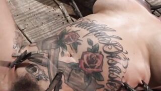 Busty tattooed slut tortured play