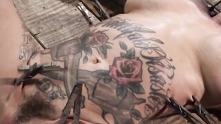 Busty tattooed slut tortured play