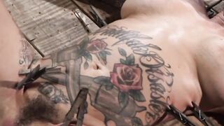 Busty tattooed slut tortured play