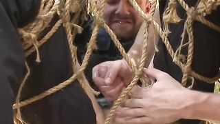 Officer Jimmy Bullet shown no mercy while restrained to a tree