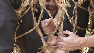 Officer Jimmy Bullet shown no mercy while restrained to a tree