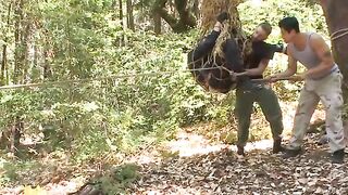 Officer Jimmy Bullet shown no mercy while restrained to a tree