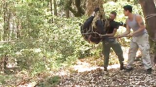 Officer Jimmy Bullet shown no mercy while restrained to a tree