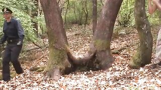 Officer Jimmy Bullet shown no mercy while restrained to a tree