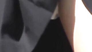 Uniformed girl rubs under her skirt and pees through panties