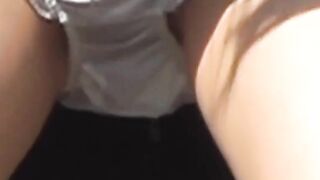 Uniformed girl rubs under her skirt and pees through panties