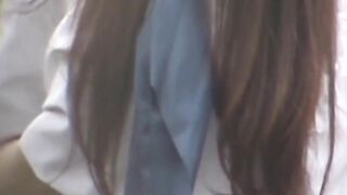 Uniformed girl rubs under her skirt and pees through panties