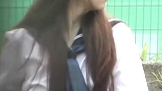 Uniformed girl rubs under her skirt and pees through panties