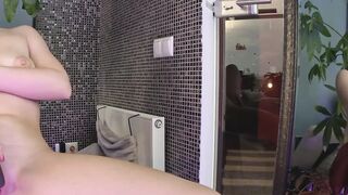 Babyhunters Gets Off in the Mirror With a Plug in Her Ass and a Clit Sucker Locked On