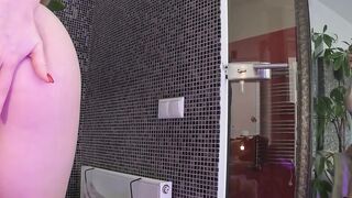 Babyhunters Gets Off in the Mirror With a Plug in Her Ass and a Clit Sucker Locked On