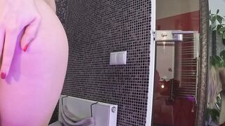 Babyhunters Gets Off in the Mirror With a Plug in Her Ass and a Clit Sucker Locked On