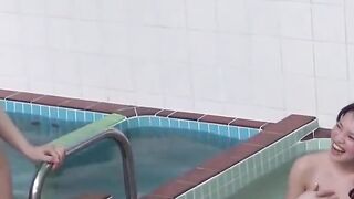 Voyeur films three petite Japanese spraying in a bathhouse