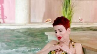 Busty MILF Lisa Pinelli in an Intimate Solo Scene