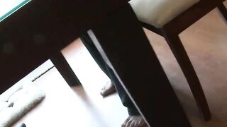 Girl plays with feet on tits