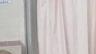 Naughty women piss on each other in a steamy bathhouse