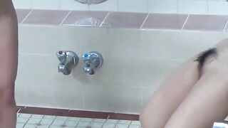 Naughty women piss on each other in a steamy bathhouse