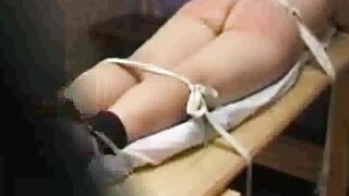 Hard Caning on Olga's sinful ass
