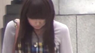 Secret cam films of cute girls urinating in public restroom