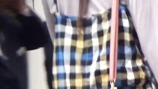 Secret cam films of cute girls urinating in public restroom