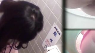 Japanese employees pee and relieve their bladders in urinal