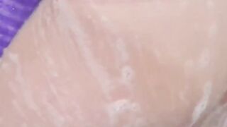 Naughty girls filmed streaming juices in a steamy bathhouse