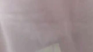 Big-Titted Brunette Squirts Milk on Webcam