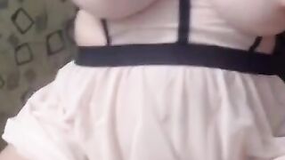 Big-Titted Brunette Squirts Milk on Webcam