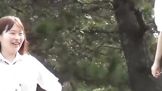 Three schoolgirls have fun pissing together outdoors
