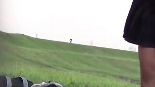 Three schoolgirls have fun pissing together outdoors