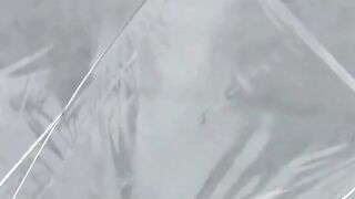 Naughty schoolgirls collect golden showers with an umbrella
