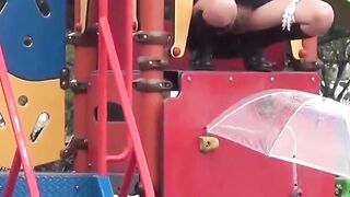 Naughty schoolgirls collect golden showers with an umbrella